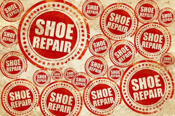 Schuhreparatur, roter Stempel auf Grunge-Papier — Stockfoto