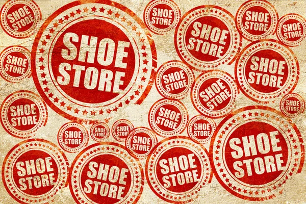 Loja de sapatos, selo vermelho em uma textura de papel grunge — Fotografia de Stock
