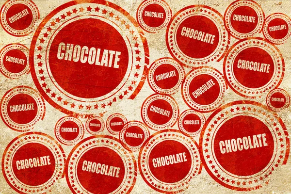 Delizioso segno di cioccolato, timbro rosso su una texture di carta grunge — Foto Stock