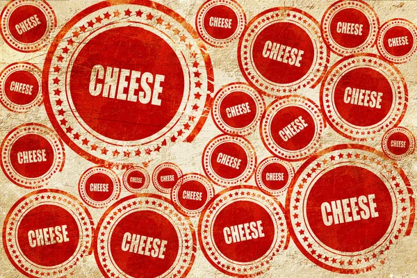 Delicioso signo de queso, sello rojo en una textura de papel grunge —  Fotos de Stock