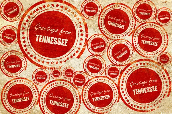 Hälsningar från Tennessee, röd stämpel på en grunge papper textur — Stockfoto