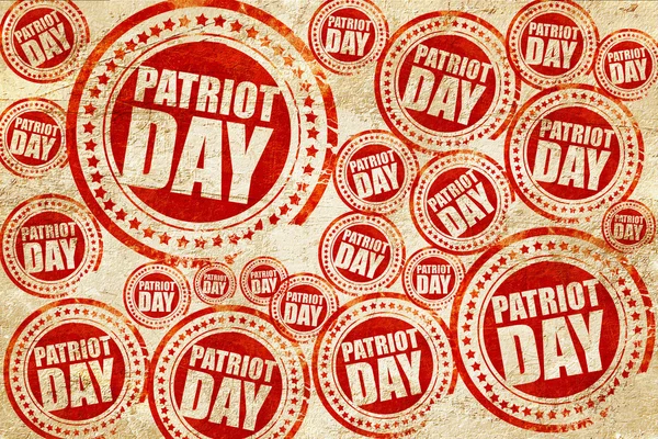 Dia patriota, selo vermelho em uma textura de papel grunge — Fotografia de Stock