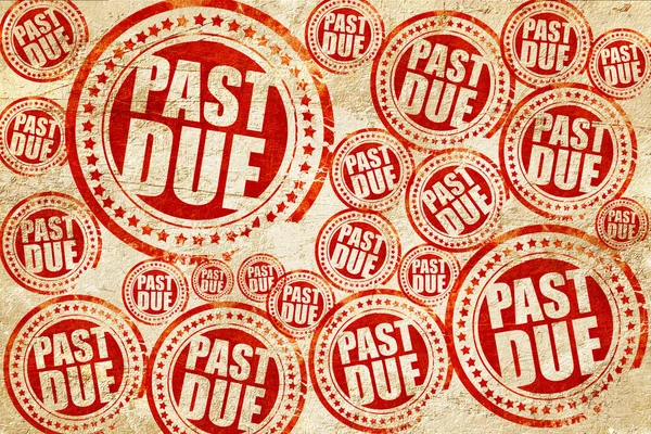 past due, red stamp on a grunge paper texture