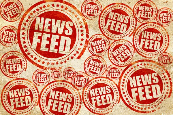 Nieuws-feed, rode stempel op een grunge papier textuur — Stockfoto