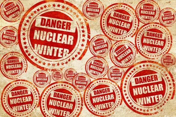 Fondo de peligro nuclear, sello rojo en una textura de papel grunge — Foto de Stock