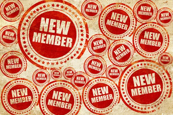 Novo membro, selo vermelho em uma textura de papel grunge — Fotografia de Stock