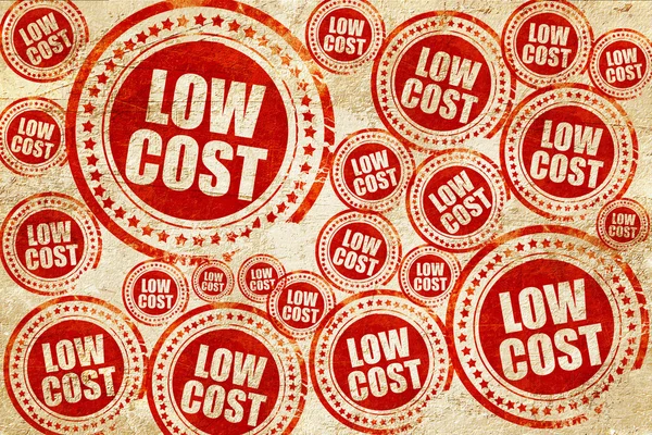 Low cost, red stamp on a grunge paper texture — Stock Photo, Image