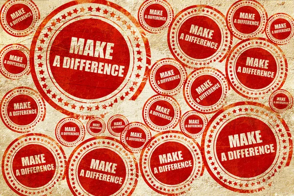 Fazer a diferença, selo vermelho em uma textura de papel grunge — Fotografia de Stock
