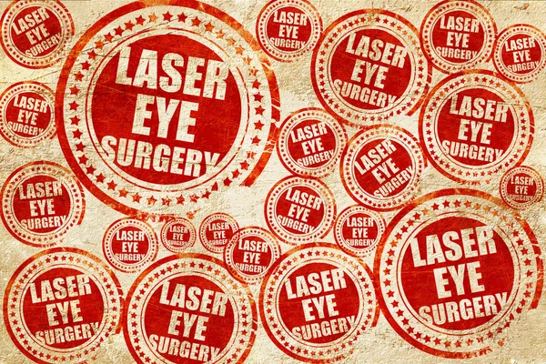 Chirurgia dell'occhio laser, timbro rosso su una texture di carta grunge — Foto Stock