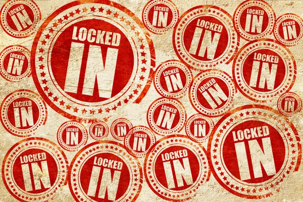 Locked in, red stamp on a grunge paper texture — Stock Photo, Image