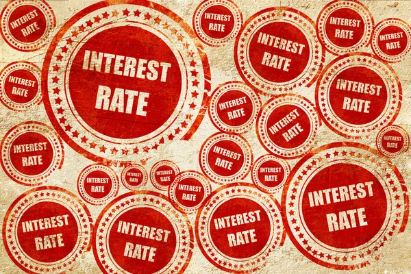 Roadsign of higher interest rates ahead against blue sky, red st — Stock Photo, Image