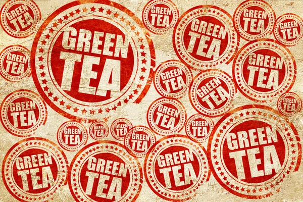 Groene thee, rode stempel op een grunge papier textuur — Stockfoto