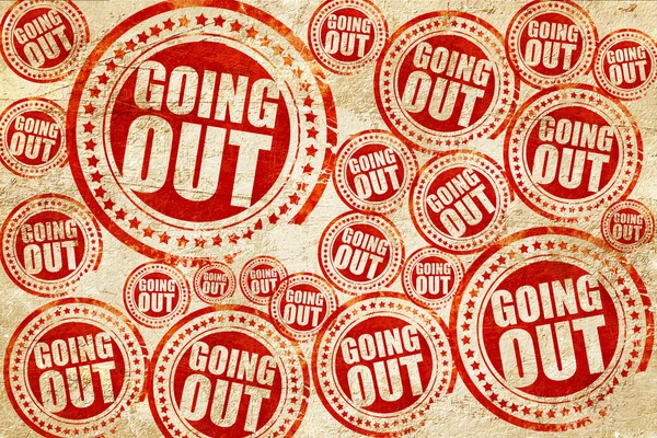 Going out, red stamp on a grunge paper texture — Stock Photo, Image