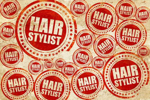 Estilista de cabelo, selo vermelho em uma textura de papel grunge — Fotografia de Stock