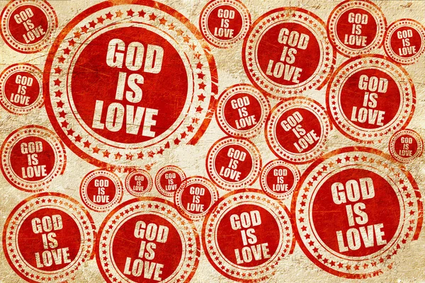 Gud är kärlek, röd stämpel på en grunge pappersstruktur — Stockfoto
