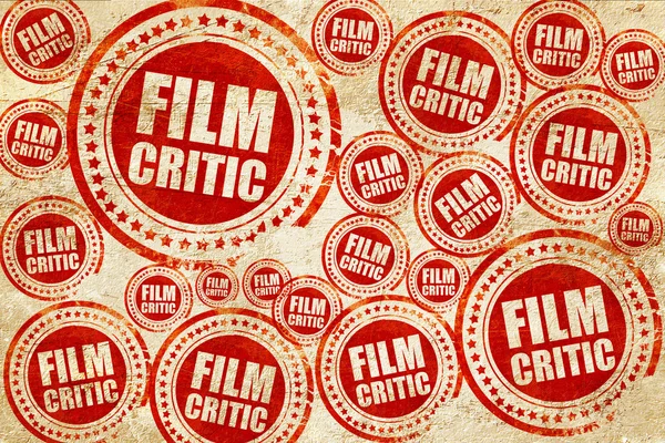 Film krytyk, czerwony znaczek na grunge tekstury papieru — Zdjęcie stockowe
