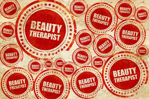 Terapeuta de beleza, selo vermelho em uma textura de papel grunge — Fotografia de Stock