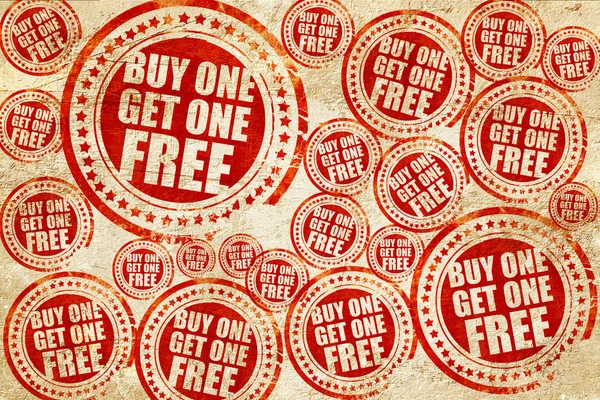 buy one get one free, red stamp on a grunge paper texture
