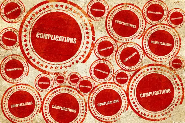 Complicaciones, sello rojo en una textura de papel grunge — Foto de Stock