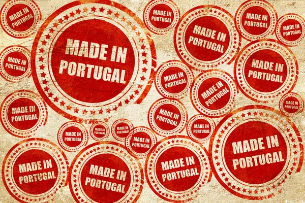 Hecho en portugal, sello rojo en una textura de papel grunge — Foto de Stock