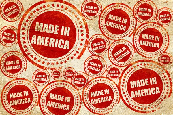 Gemaakt in Amerika, rode stempel op een grunge papier textuur — Stockfoto