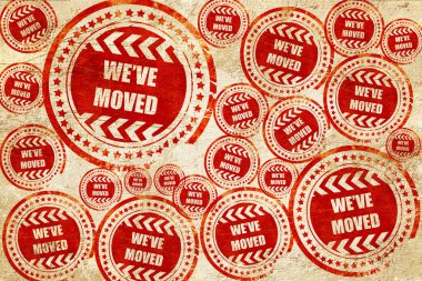 Weve moved sign, red stamp on a grunge paper texture clipart