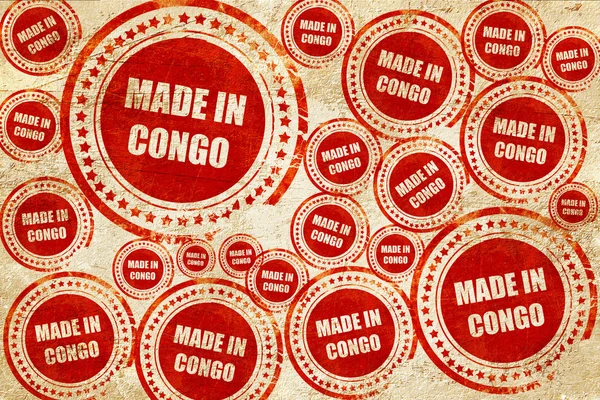 Gemaakt in congo, rode stempel op een grunge papier textuur — Stockfoto