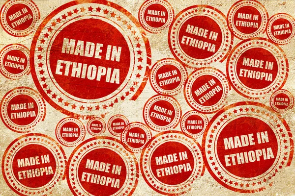 Зроблено в етіопії, червоний штамп на текстурі гранжевого паперу — стокове фото