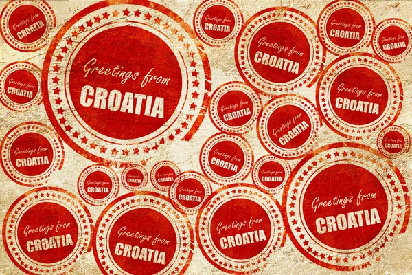 Salutations de croatie, timbre rouge sur une texture de papier grunge — Photo