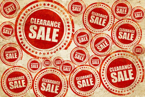 Clearance sale, red stamp on a grunge paper texture — Stock Photo, Image