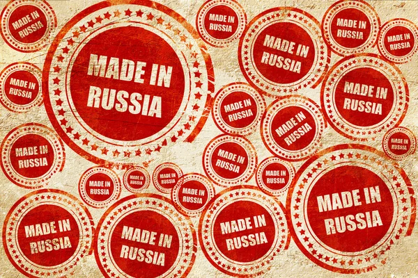 Feito na Rússia, selo vermelho em uma textura de papel grunge — Fotografia de Stock