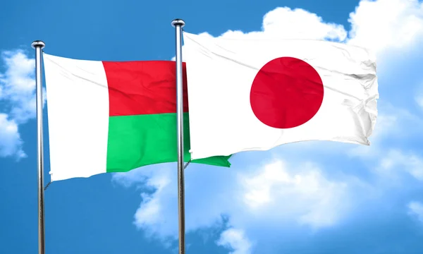 Bandiera Madagascar con bandiera Giappone, rendering 3D — Foto Stock