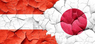 Avusturya bayrağı bir grunge Japonya bayrağı ile duvar kırık