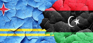 Aruba bayrağı bir grunge Libya bayrağı ile duvar kırık