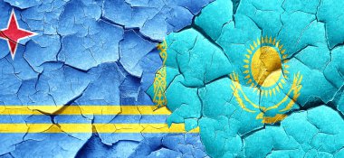 Aruba bayrağı bir grunge Kazakistan bayrağı ile duvar kırık