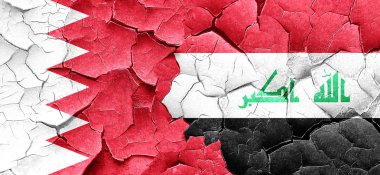 Bahreyn bayrağı bir grunge Irak bayrağı ile duvar kırık