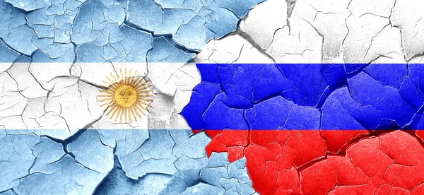 Bandera de Argentina con bandera de Rusia en una pared agrietada grunge — Foto de Stock