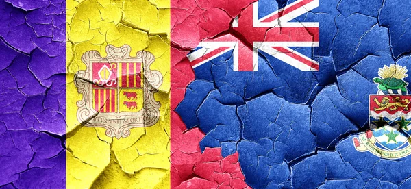Andorra flag with Cayman islands flag on a grunge cracked wall — Stock Photo, Image
