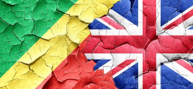 Kongo Cumhuriyeti bayrağı bir grunge Büyük Britanya bayrağı ile duvar kırık