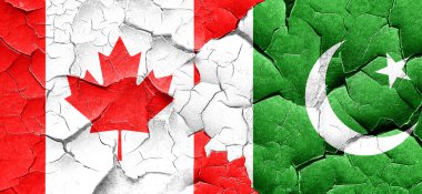 Kanada bayrağı bir grunge Pakistan bayrağı ile duvar kırık