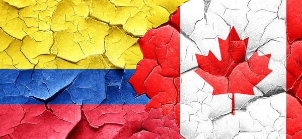 Kolumbie vlajka Kanada vlajku grunge popraskané zdi — Stock fotografie