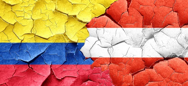 Kolombiya bayrak bir grunge Avusturya bayrağı ile duvar kırık