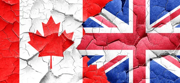 Canada flag with Great Britain flag on a grunge cracked wall — Stock Photo, Image