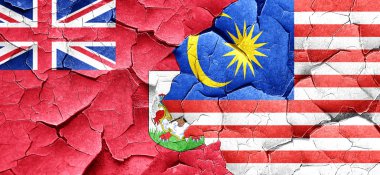 Bermuda bayrak bir grunge Malezya bayrağı ile duvar kırık