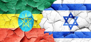 Etiyopya bayrağı bir grunge İsrail bayrağı ile duvar kırık