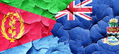 Eritre bayrak bir grunge Cayman Adaları bayrağı ile duvar kırık