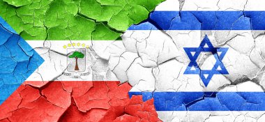 Ekvator Ginesi bayrak bir grunge İsrail bayrağı ile duvar kırık