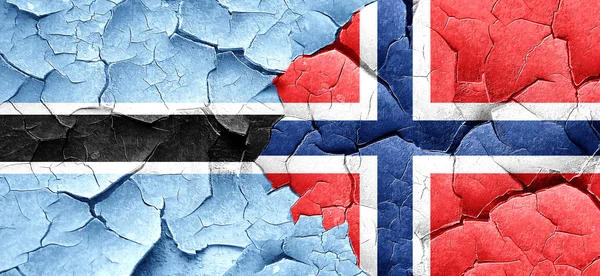 Botswana zászló Norvégia lobogója a grunge-a fal repedt — Stock Fotó