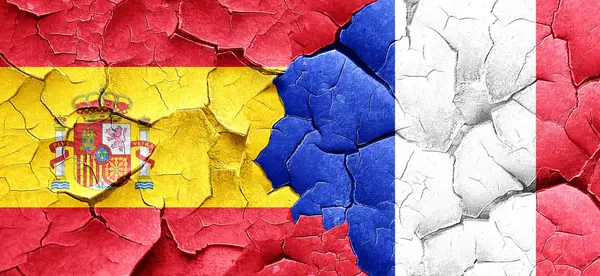 西班牙国旗与法国国旗上的 grunge 裂墙 — 图库照片