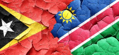 Doğu timor bayrağı bir grunge Namibya bayrağı ile duvar kırık